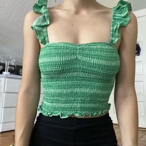 green smocked top